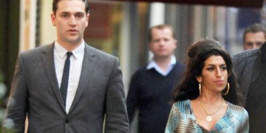 Reg Traviss i Amy Winehouse, foto: thehollywoodgossip.com