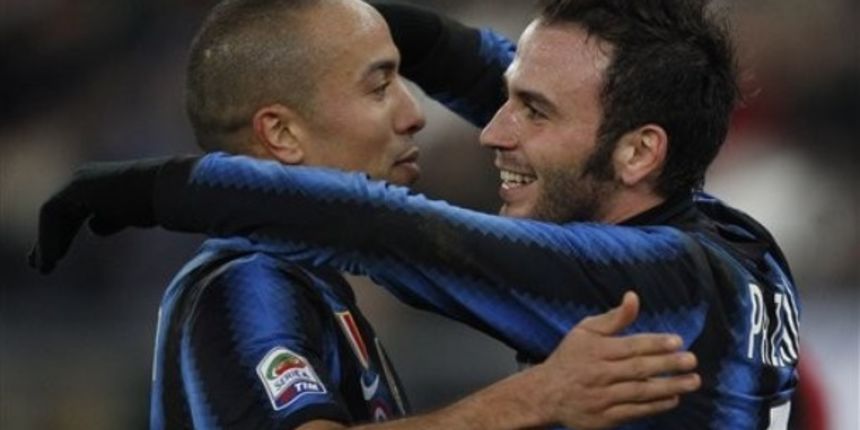 Inter Milan forward Giampaolo Pazzini, right, celebrates with his teammate midfielder Houssine Kharja // AP Photo