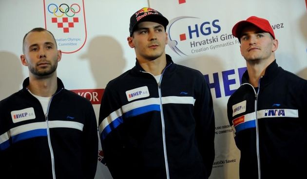 14.10.2014., Velika Gorica – Dolazak Hrvatske gimnasticke reprezentacije osvajaca medalja na svjetskom prvenstvu u Kini. Robert Seligman, Filip Ude, Mario Moznik. Photo: Daniel Kasap/PIXSELL