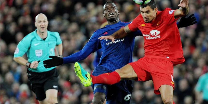 Dejan Lovren i Paul Pogba, foto: EPA/PETER POWELL/Hina