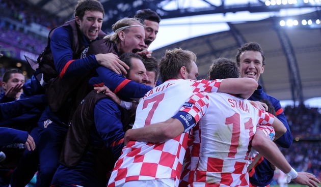 Poznan, 140612.
EURO 2012.
Gradski stadion u Poznanu.
Utakmica drugog kola skupine C, Europskog nogometnog prvenstva u Poljskoj i Ukrajini, izmedju Italije i Hrvatske.
Na fotografiji: slavlje Hrvatskih reprezentativaca nakon pogotka Marija Mandzukica.
Fot