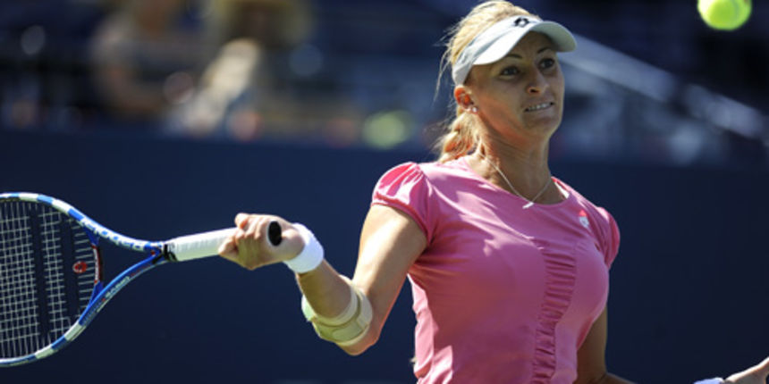 Mirjana Lucic (CRO) hits the ball back to Francesca Schiavone (ITA)[7] in a 2nd Round women’s singles match on Arthur Ashe Stadium.