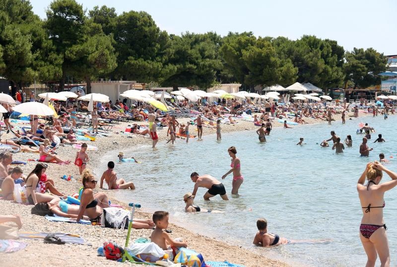Uživanje u ljetu na vodičkim plažama. Photo: Duško Jaramaz/PIXSELL Uživanje u ljetu na vodičkim plažama. Photo: Duško Jaramaz/PIXSELL