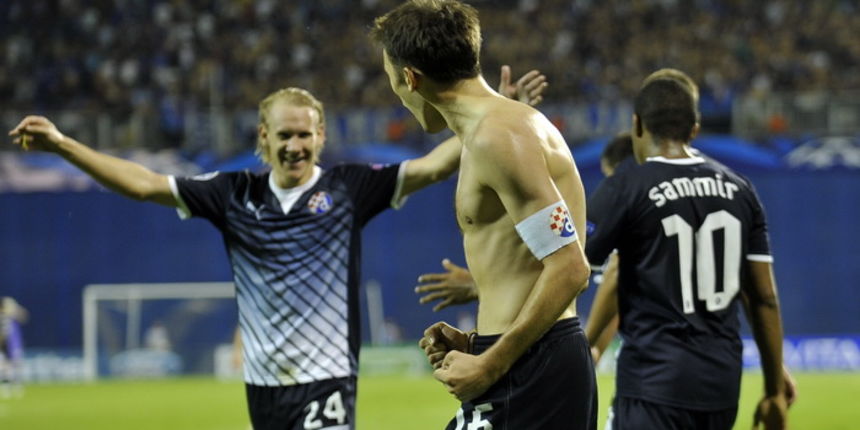 Zagreb, 220812.Maksimirski stadion.Kvalifikacijska nogometna utakmica za ulazak u Uefinu Ligu Prvaka izmedju Hrvatskog prvaka GNK Dinamo i Slovenskog Maribora.Na slici: slavlje gol Milan Badelj.Foto: Damir Krajac / CROPIX