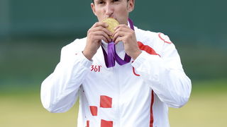 London, 060812.
Hrvatski strijelci Anton Glasnovic i Giovanni Cernogoraz u finalu trapa tijekom Olimpijskih Igara u Londonu.
Na fotografiji: Giovanni Cernogoraz osvojio je zlato.
Foto: Drago Sopta / CROPIX
