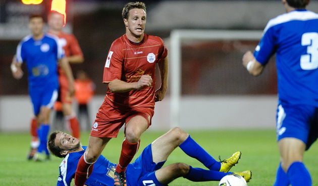 Split, 150912.
Stadion Park mladezi.
Nogometna utakmica 8. kola MAXtv 1. HNL Prve lige izmedju RNK Split i NK Zadar. 
Na fotografiji: Ante Vitaic i Igor Banovic
Foto:Tom Dubravec /  CROPIX