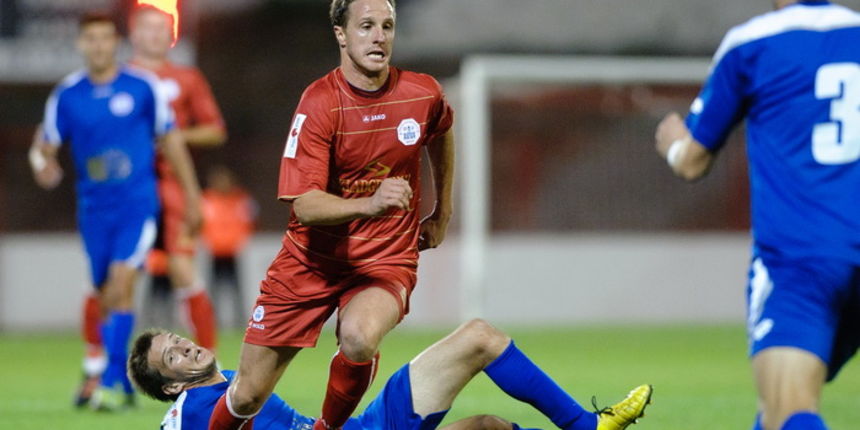 Split, 150912.
Stadion Park mladezi.
Nogometna utakmica 8. kola MAXtv 1. HNL Prve lige izmedju RNK Split i NK Zadar. 
Na fotografiji: Ante Vitaic i Igor Banovic
Foto:Tom Dubravec /  CROPIX