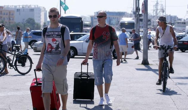 26.07.2013., Zadar – Velika guzva u zadarskoj trajektnoj luci. Photo: Zeljko Mrsic/PIXSELL Autor  Zeljko Mrsic/PIXSELL guzve, trajekt, Luka, turisti