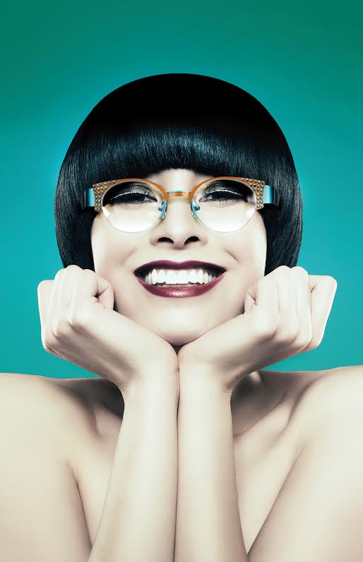 Young woman with black bob land hands on chin — Image by © Ocean/Corbis Young woman with black bob land hands on chin — Image by © Ocean/Corbis