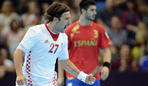 London, 060812.
Dvorana Copper Box.
Hrvatska muska rukometna reprezentacija igra utakmicu posljednjeg kola u skupini B protiv Spanjolske tijekom Olimpijskih Igra u Londonu.
Na fotografiji: Ivan Cupic se veseli nakon gola.
Foto: Drago Sopta / CROPIX