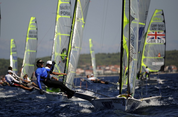 Zadar, 310809.
Europsko prvenstvo u jedrenju za klasu 49er 2009.
Danas je prvi dan regularnog natjecanja za jedrilicare u klasi 49er koje se odrzava od 29og kolovoza do 5og rujna u organizaciji JK Uskok.
Na slici: detalj s regate 49er. Ruska posada Pavel Zadar, 310809.
Europsko prvenstvo u jedrenju za klasu 49er 2009.
Danas je prvi dan regularnog natjecanja za jedrilicare u klasi 49er koje se odrzava od 29og kolovoza do 5og rujna u organizaciji JK Uskok.
Na slici: detalj s regate 49er. Ruska posada Pavel