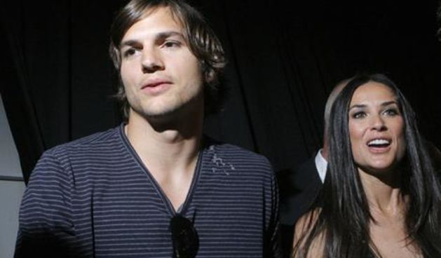Ashton Kutcher and Demi Moore attend the Diesel show.