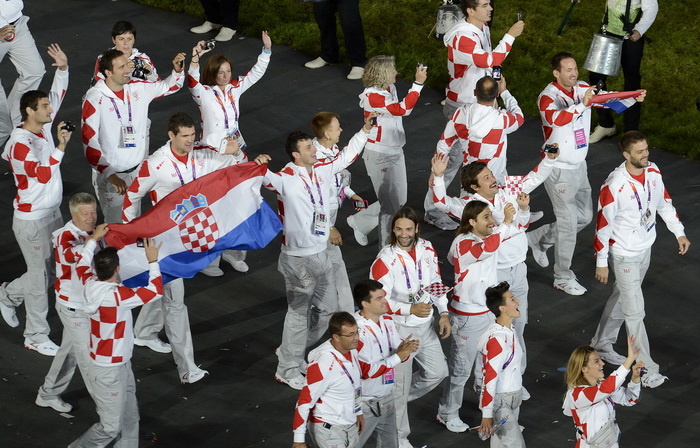 London, 270712.
Olimpijski stadion.
Svecano otvaranje Olimpijskih Igra u Londonu.
Na fotografiji: hrvatski sportasi u defileu, rukometni golman Venio Losert nosi zastavu.
Foto: Drago Sopta / CROPIX
