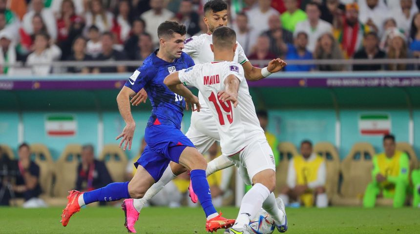 US Christian Pulisic and Iranian Majid Hosseini US Christian Pulisic and Iranian Majid Hosseini