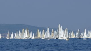 Split, 240911.
Na 80.Mrduja jubilarnoj regati izislo 242 plovila u borbu za veliki trofej. Na startu vjetar nije bio naklonjen jedrilicarima pa su mnogi satima plutali u bonaci.
Na slici:regata.
Foto: Jadran Babic / CROPIX