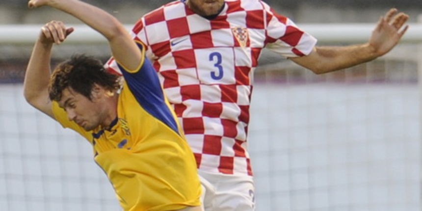 Zagreb, 060609.
Stadion Maksimir.
Kvalifikacijska utakmica skupine 6 izmedju reprezentacija Hrvatske i Ukrajine za Svjetsko nogometno prvenstvo u Juznoafrickoj Republici 2010 godine.
Na slici: Josip Simunic i Milevskyi.
Foto: Drago Sopta / CROPIX