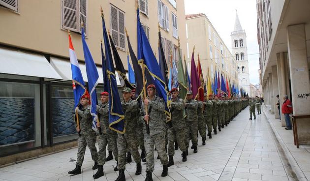21.01.2014., Zadar – Mimohod postrojbi sudionica operacije akcija Maslenica s ratnim zastavama, uz pratnju orkestra Oruzanih snaga RH. Photo: Filip Brala/PIXSELL