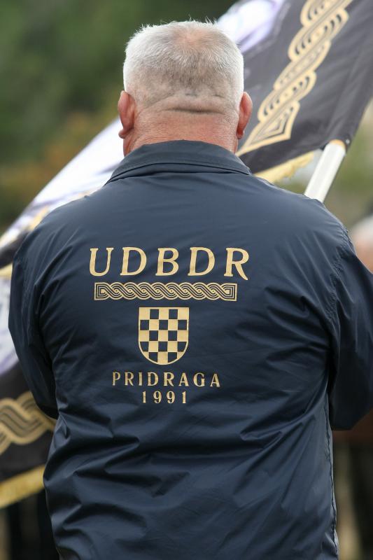 Polaganjem vijenaca na središnjem križu, u Novigradu je obilježena obljetnica pogibije članova HRM-a i Druge gardijske brigade za vrijeme akcije Maslenica. Photo: Dino Stanin/PIXSELL Polaganjem vijenaca na središnjem križu, u Novigradu je obilježena obljetnica pogibije članova HRM-a i Druge gardijske brigade za vrijeme akcije Maslenica. Photo: Dino Stanin/PIXSELL