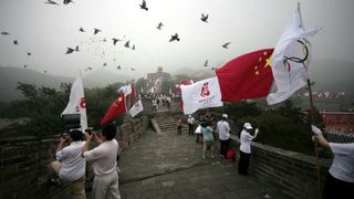 Olimpijska baklja na kineskom zidu