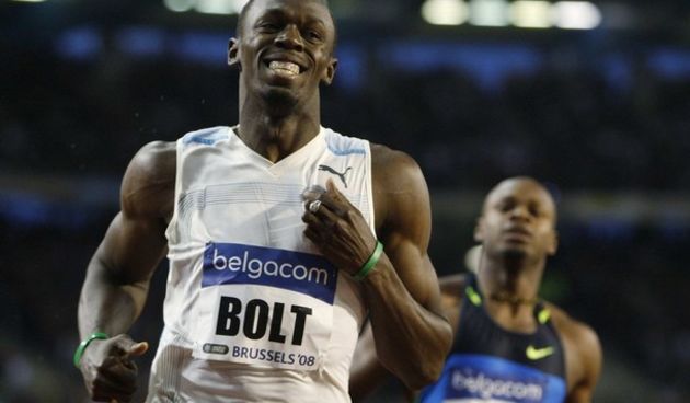 Bolt i Powell (daylife.com)