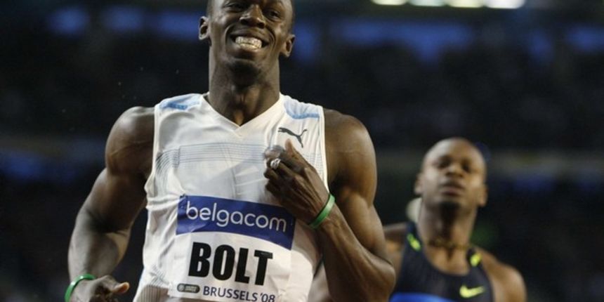 Bolt i Powell (daylife.com)