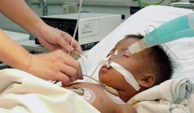 Zaraženo dijete u Kini (Foto: AP)