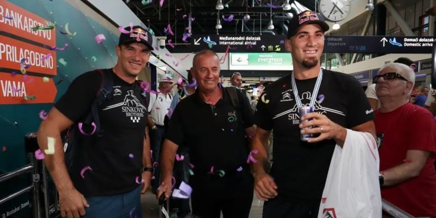 07.09.2015., Zagreb – U Zracnoj luci Zagreb docekana su braca Martin i Valent Sinkovic, svjetski prvaci u veslanj. Braca Sinkovic sa svojim trenerom Nikolom Bralicem. Photo: Tomislav Miletic/PIXSELL