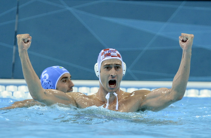 London, 120812.
Vaterpolo Arena.
Hrvatska muska vaterpolo reprezentacija igra finalnu utakmicu protiv Italije tijekom Olimpijskih Igara u Londonu.
Na fotografiji: Hrvatska je osvojila zlatnu medalju, Maro Jokovic.
Foto: Drago Sopta / CROPIX London, 120812.
Vaterpolo Arena.
Hrvatska muska vaterpolo reprezentacija igra finalnu utakmicu protiv Italije tijekom Olimpijskih Igara u Londonu.
Na fotografiji: Hrvatska je osvojila zlatnu medalju, Maro Jokovic.
Foto: Drago Sopta / CROPIX