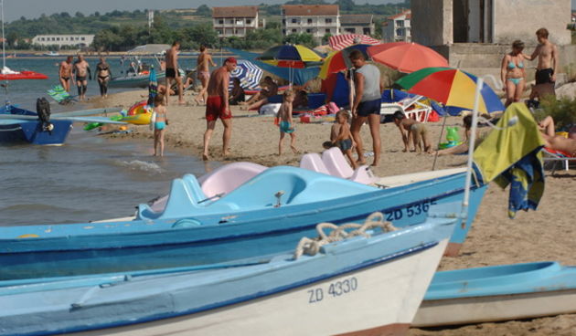 Zadar, 160709.
Ninske pjescane place pravi su mamac za kupace, a tu je i poznato ninsko blato koje lijeci reumu i razne kozne bolesti.
Na fotografiji: jedna od mnogobrojnih ninskih plaza.
Foto: Andrija Lucic / CROPIX