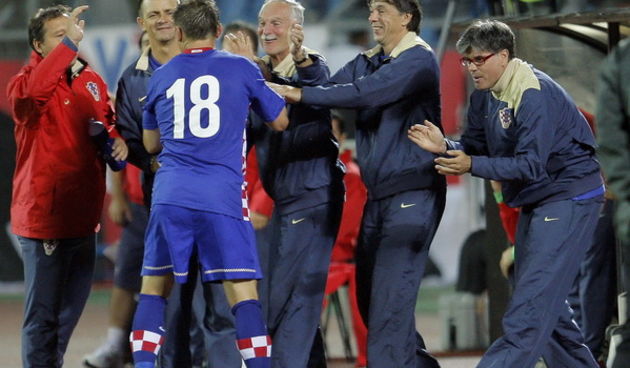 Minsk, 120809.
Stadion Dinamo Minsk
Kvalifikacijska nogometna utakmica za Svjetsko nogometno prvenstvo 2010. Bjelorusija – Hrvatska.
Na fotografiji: Slavlje nakon postignutog gola Ivice Olica.
Na fotografiji:Dominik Sizgoreo,Marijan Mrmic, dr. Boris Nemec