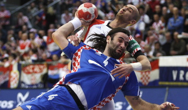 Graz, 210110.
EURO 2010 u rukometu. 
Trece kolo skupine A. Utakmica Hrvatska – Rusija.
Na fotografiji:  Ivano Balic, Konstantin Igropulo.
Foto: Nenad Dugi / Cropix