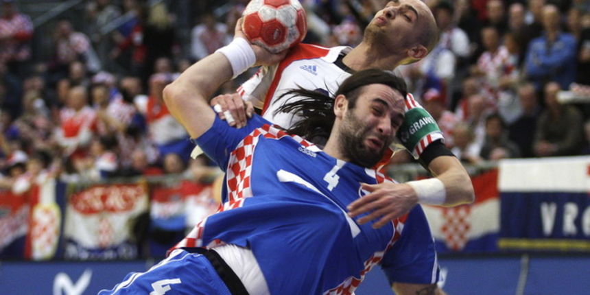 Graz, 210110.
EURO 2010 u rukometu. 
Trece kolo skupine A. Utakmica Hrvatska – Rusija.
Na fotografiji:  Ivano Balic, Konstantin Igropulo.
Foto: Nenad Dugi / Cropix