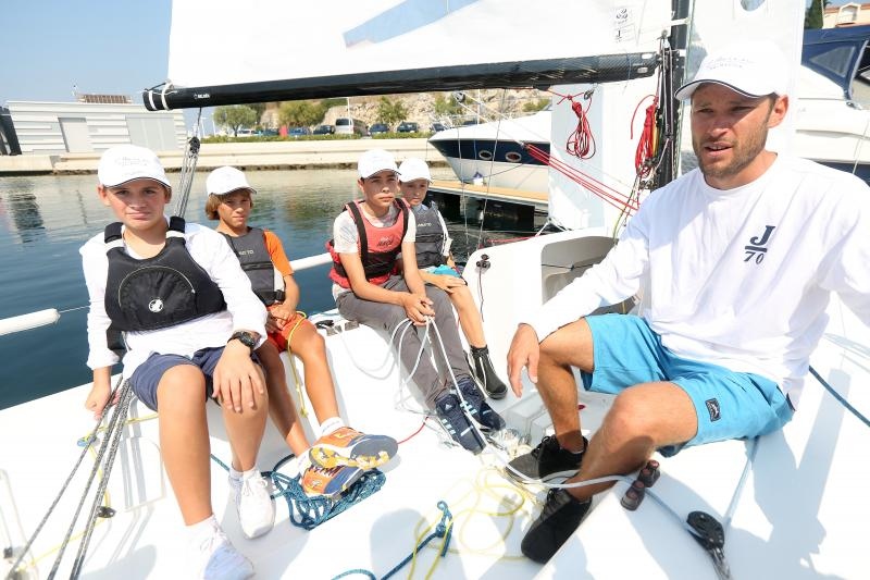 Zlatni olimpijci Fantela i Marenić družili se sa šibenskom djecom povodom dana jedrenja. Photo: Duško Jaramaz/PIXSELL Zlatni olimpijci Fantela i Marenić družili se sa šibenskom djecom povodom dana jedrenja. Photo: Duško Jaramaz/PIXSELL