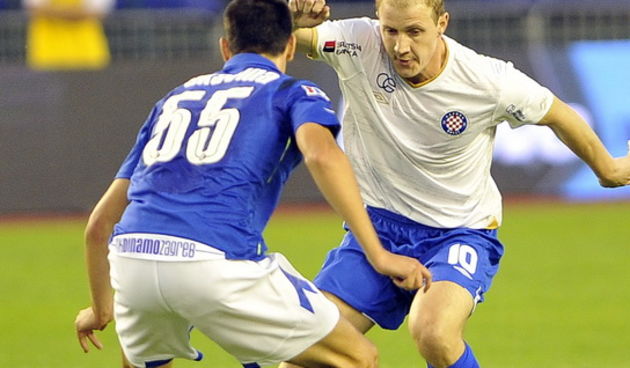 Split, 110910.  Stadion, Poljud. Nogometna utakmica, 7. kolo prve HNL,  Hajduk – Dinamo. Na slici: Senijad Ibricic i Ante Rukavina. Foto: Josko Ponos/ CROPIX