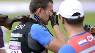 London, 060812.
Hrvatski strijelci Anton Glasnovic i Giovanni Cernogoraz u finalu trapa tijekom Olimpijskih Igara u Londonu.
Na fotografiji: Giovanni Cernogoraz osvojio je zlato.
Foto: Drago Sopta / CROPIX
