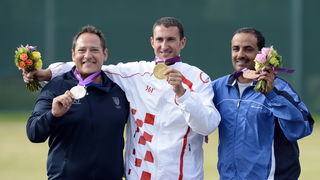 London, 060812.
Hrvatski strijelci Anton Glasnovic i Giovanni Cernogoraz u finalu trapa tijekom Olimpijskih Igara u Londonu.
Na fotografiji: Giovanni Cernogoraz osvojio je zlato.
Foto: Drago Sopta / CROPIX