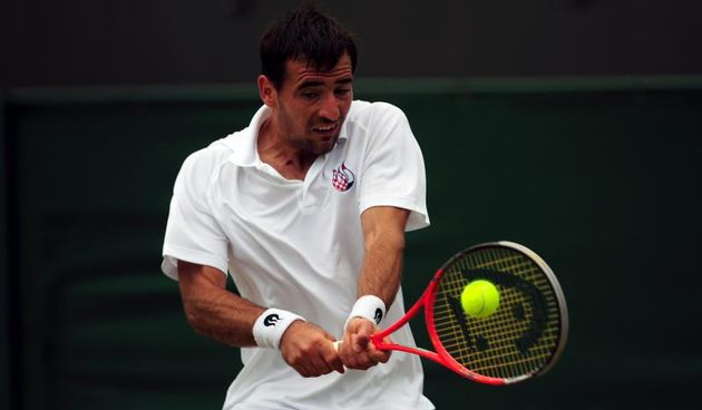2013 Wimbledon Championships – Day Seven – The All England Lawn Tennis and Croquet ClubCroatia’s Ivan Dodig in action against Spain’s David FerrerEMPICS Sport Photo: Press Association/PIXSELL