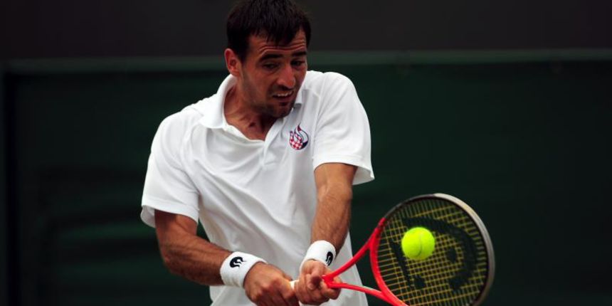 2013 Wimbledon Championships – Day Seven – The All England Lawn Tennis and Croquet ClubCroatia’s Ivan Dodig in action against Spain’s David FerrerEMPICS Sport Photo: Press Association/PIXSELL