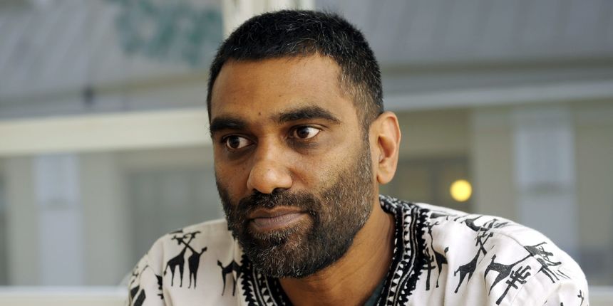 South African human rights activist and international executive director of environmentalist group Greenpeace Kumi Naidoo gives a press conference in Helsinki, Finland, on October 15, 2013, on the current situation of detained Arctic Sunrise ship activist South African human rights activist and international executive director of environmentalist group Greenpeace Kumi Naidoo gives a press conference in Helsinki, Finland, on October 15, 2013, on the current situation of detained Arctic Sunrise ship activist