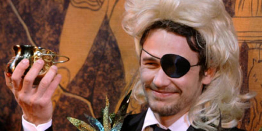 Actor James Franco holds up his pudding pot award as he is honored as Harvard University’s Hasty Pudding Theatricals Man of the Year in Cambridge, Mass., Friday Feb. 13, 2009. (AP Photo/Charles Krupa)