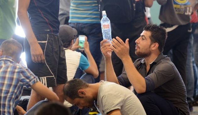 Izbjeglice i imigranti na željezničkom kolodvoru Keleti ulicama Budimpešte, Photo: Marko Jurinec/PIXSELL