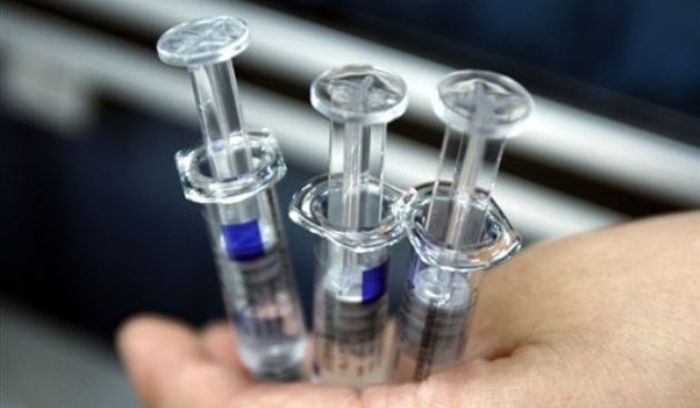 Laboratorijske šprice, Foto: AP Photo