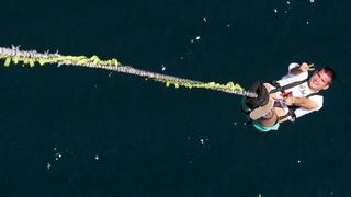 28.6.2014., Maslenica – Gimnasticar Marijo Moznik otvorio je sezonu bungee skokova s Maslenickog mosta. On je izveo dvostruki salto s uronom u more. Photo: Dino Stanin/PIXSELL