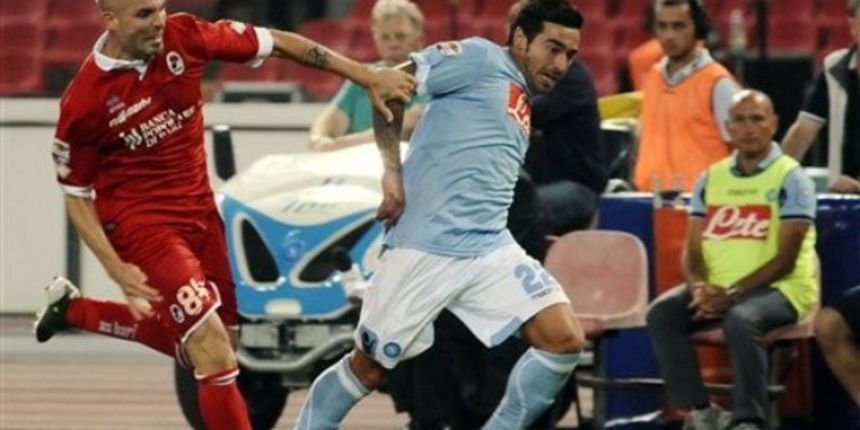Bari Andrea Raggi, left, and Napoli Argentine forward Ezequiel Lavezzi / AP Photo Bari Andrea Raggi, left, and Napoli Argentine forward Ezequiel Lavezzi / AP Photo