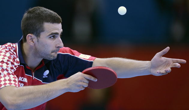 London, 290712.
Dvorana Excel.
Hrvatski stolnotenisac Andrej Gacina prosao u 3. kolo pobjedivsi svedjanina Jorgen Perssona tokom Olimpijskih Igra u Londonu.
Na fotografiji: Andrej Gacina.
Foto: Drago Sopta / CROPIX