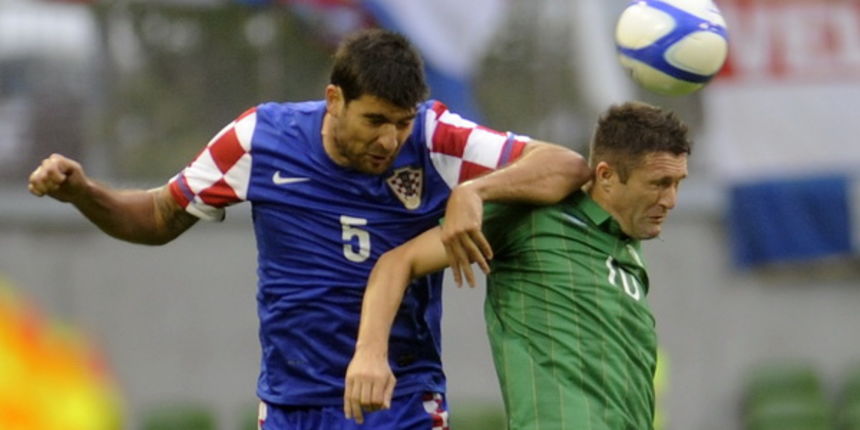 Dublin, 100811. Aviva Arena Stadion. Prijateljska nogometna utakmica izmedju Irske i Hrvatske. Na slici: Vedran Corluka i Robie Keane u skoku za loptu. Foto: Drago Sopta / CROPIX Dublin, 100811. Aviva Arena Stadion. Prijateljska nogometna utakmica izmedju Irske i Hrvatske. Na slici: Vedran Corluka i Robie Keane u skoku za loptu. Foto: Drago Sopta / CROPIX