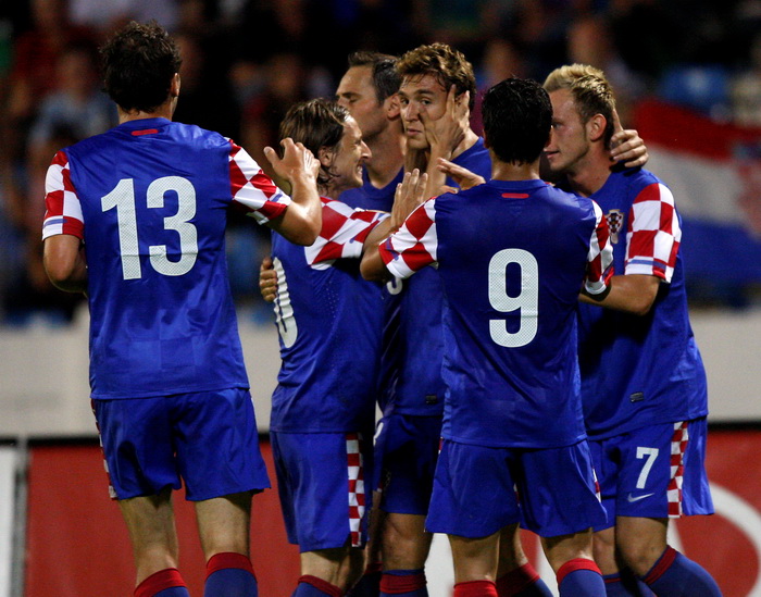 Bratislava, Slovacka, 110810.
Stadion Pasienky.
Medjunarodna  prijateljska nogometna utakmica 
Slovacka – Hrvatska
Na fotografiji: slavlje igraca hrvatske reprezentacije, Gordon Schildenfeld, Luka Modric, Nikica Jelavic, Eduardo i Ivan Rakitic.
Foto: Rona