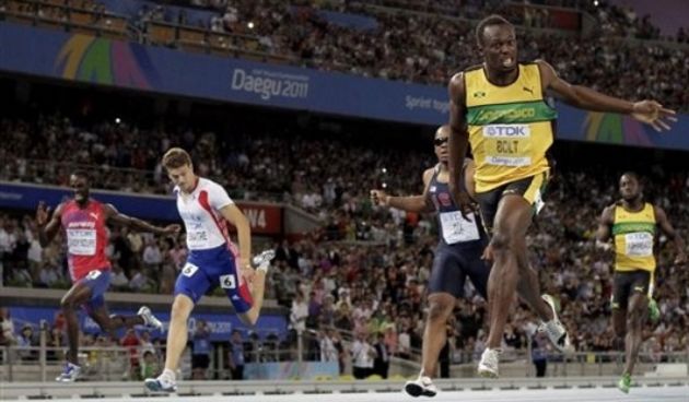 Bolt i Lemaitre u cilju, Foto: AP Photo