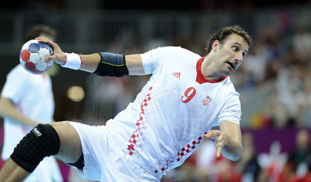 London, 100812.
Kosarkaska dvorana.
Hrvatska muska rukometna reprezentacija igra polufinalnu utakmicu protiv Francuske na Olimpijskim igrama u Londonu.
Na fotografiji: Igor Vori.
Foto: Drago Sopta / CROPIX