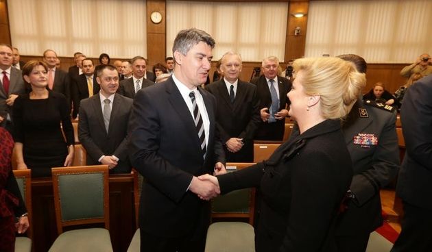 Zagreb – U Hrvatskom Saboru odrzana je 6. obljetnica clanstva Republike Hrvatske u NATO savez. Prvi susret premjera Zorana Milanovica i predsjednice Kolinde Grabar Kitarovic. Photo: Zeljko Lukunic/PIXSELL